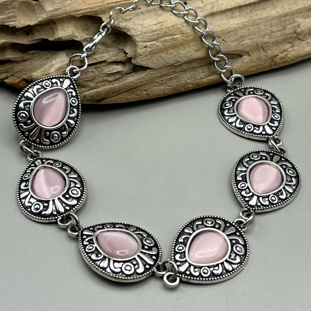 Elegant Silver and Pink Bracelet